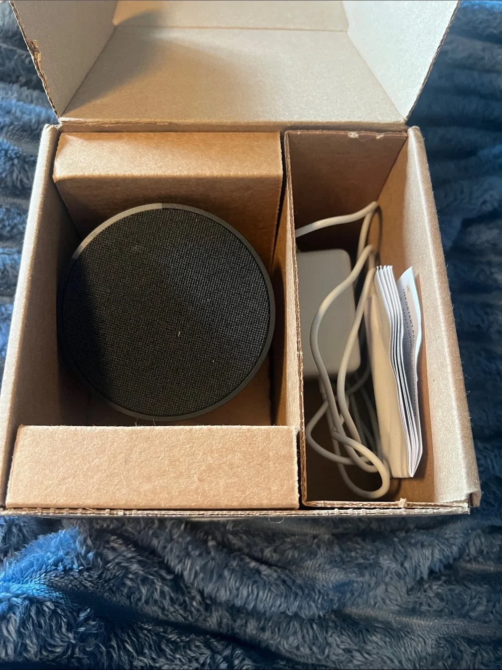Amazon Alexa Black Bluetooth Speaker with White Charging Cable